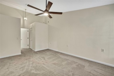 This charming villa, located on the first hole of the Grand on Timber Pines Golf Course in Florida - for sale on GolfHomes.com, golf home, golf lot