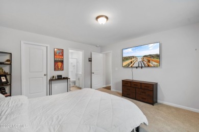Discover this nearly new, charming single-level home with a low on Lennon Hills Golf Course in North Carolina - for sale on GolfHomes.com, golf home, golf lot