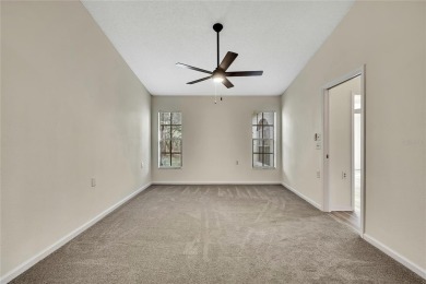 This charming villa, located on the first hole of the Grand on Timber Pines Golf Course in Florida - for sale on GolfHomes.com, golf home, golf lot