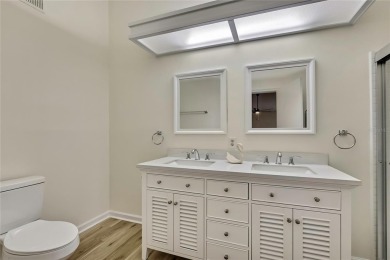 This charming villa, located on the first hole of the Grand on Timber Pines Golf Course in Florida - for sale on GolfHomes.com, golf home, golf lot
