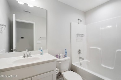 Discover this nearly new, charming single-level home with a low on Lennon Hills Golf Course in North Carolina - for sale on GolfHomes.com, golf home, golf lot