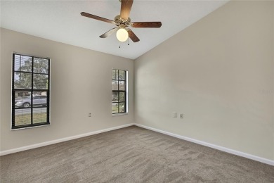 This charming villa, located on the first hole of the Grand on Timber Pines Golf Course in Florida - for sale on GolfHomes.com, golf home, golf lot
