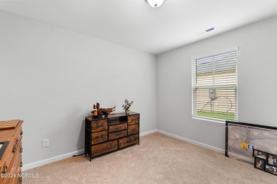 Discover this nearly new, charming single-level home with a low on Lennon Hills Golf Course in North Carolina - for sale on GolfHomes.com, golf home, golf lot