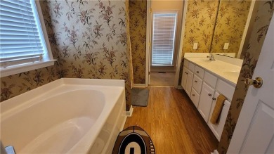 Welcome to this private home tucked in the River North Golf on Canongate At Healy Point Country Club in Georgia - for sale on GolfHomes.com, golf home, golf lot
