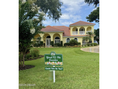AWARD WINNING LANDSCAPING! Step into elevated Florida living on Halifax Plantation Golf Club in Florida - for sale on GolfHomes.com, golf home, golf lot