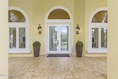 AWARD WINNING LANDSCAPING! Step into elevated Florida living on Halifax Plantation Golf Club in Florida - for sale on GolfHomes.com, golf home, golf lot