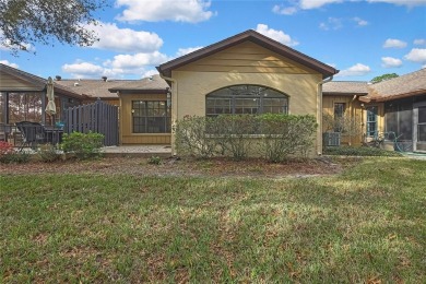 This charming villa, located on the first hole of the Grand on Timber Pines Golf Course in Florida - for sale on GolfHomes.com, golf home, golf lot