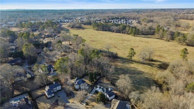 Refined Elegance Meets Modern Luxury at 6125 Paddock Lane on Polo Golf and Country Club in Georgia - for sale on GolfHomes.com, golf home, golf lot