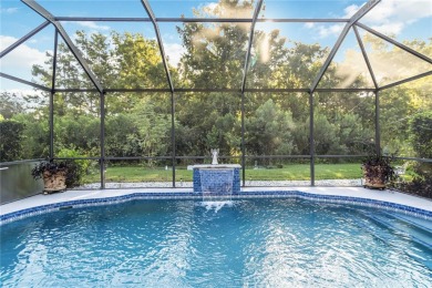 Enjoy serene preserve and golf course views in this elegant on River Strand Golf and Country Club At Heritage Harbour  in Florida - for sale on GolfHomes.com, golf home, golf lot