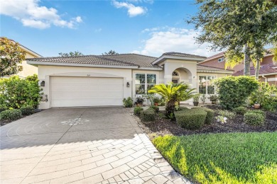 Enjoy serene preserve and golf course views in this elegant on River Strand Golf and Country Club At Heritage Harbour  in Florida - for sale on GolfHomes.com, golf home, golf lot