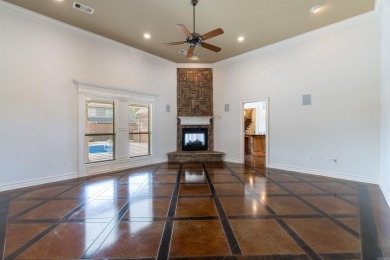 This one has it ALL! Situated on a large corner lot, this 4-bed on Centennial Valley Golf Course in Arkansas - for sale on GolfHomes.com, golf home, golf lot