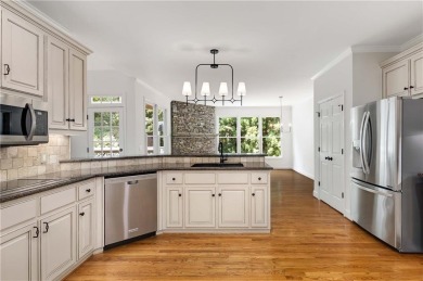 This beautiful home overlooks the golf course with primary on on The Golf Club of Georgia in Georgia - for sale on GolfHomes.com, golf home, golf lot