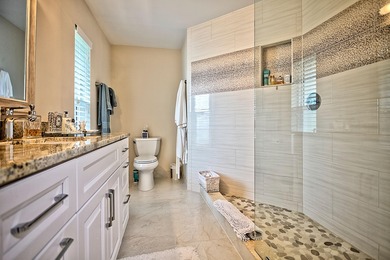 Stunning golf course views, 3 bedroom, 3 full bath home. Primary on Atlantis Golf Club in Florida - for sale on GolfHomes.com, golf home, golf lot