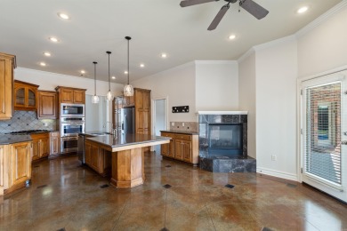 This one has it ALL! Situated on a large corner lot, this 4-bed on Centennial Valley Golf Course in Arkansas - for sale on GolfHomes.com, golf home, golf lot