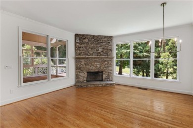 This beautiful home overlooks the golf course with primary on on The Golf Club of Georgia in Georgia - for sale on GolfHomes.com, golf home, golf lot