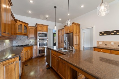 This one has it ALL! Situated on a large corner lot, this 4-bed on Centennial Valley Golf Course in Arkansas - for sale on GolfHomes.com, golf home, golf lot