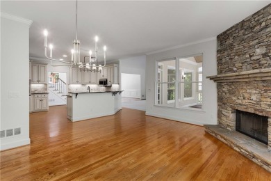 This beautiful home overlooks the golf course with primary on on The Golf Club of Georgia in Georgia - for sale on GolfHomes.com, golf home, golf lot