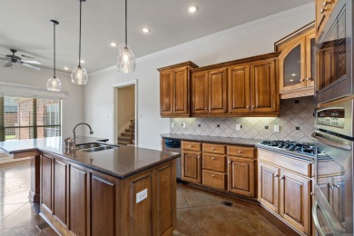 This one has it ALL! Situated on a large corner lot, this 4-bed on Centennial Valley Golf Course in Arkansas - for sale on GolfHomes.com, golf home, golf lot