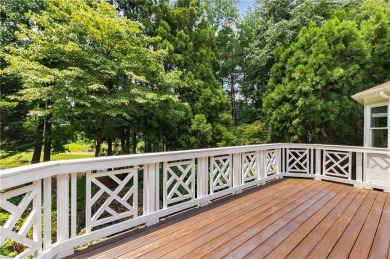 This beautiful home overlooks the golf course with primary on on The Golf Club of Georgia in Georgia - for sale on GolfHomes.com, golf home, golf lot