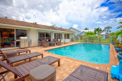 Stunning golf course views, 3 bedroom, 3 full bath home. Primary on Atlantis Golf Club in Florida - for sale on GolfHomes.com, golf home, golf lot