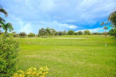 Stunning golf course views, 3 bedroom, 3 full bath home. Primary on Atlantis Golf Club in Florida - for sale on GolfHomes.com, golf home, golf lot