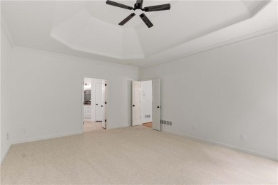 This beautiful home overlooks the golf course with primary on on The Golf Club of Georgia in Georgia - for sale on GolfHomes.com, golf home, golf lot