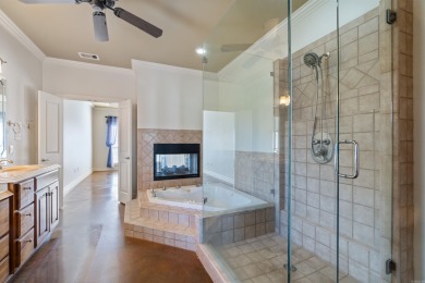 This one has it ALL! Situated on a large corner lot, this 4-bed on Centennial Valley Golf Course in Arkansas - for sale on GolfHomes.com, golf home, golf lot