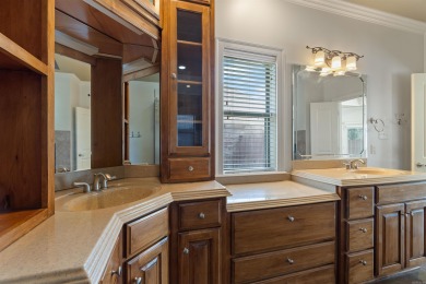 This one has it ALL! Situated on a large corner lot, this 4-bed on Centennial Valley Golf Course in Arkansas - for sale on GolfHomes.com, golf home, golf lot