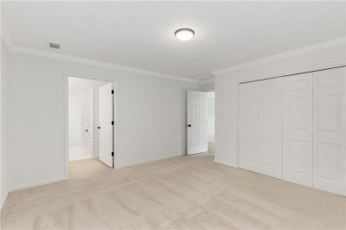 This beautiful home overlooks the golf course with primary on on The Golf Club of Georgia in Georgia - for sale on GolfHomes.com, golf home, golf lot