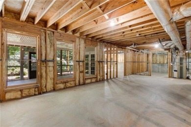This beautiful home overlooks the golf course with primary on on The Golf Club of Georgia in Georgia - for sale on GolfHomes.com, golf home, golf lot