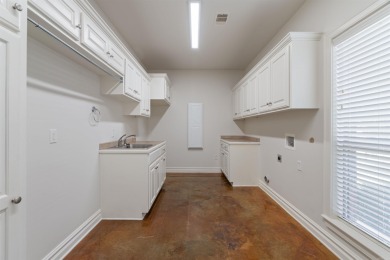 This one has it ALL! Situated on a large corner lot, this 4-bed on Centennial Valley Golf Course in Arkansas - for sale on GolfHomes.com, golf home, golf lot