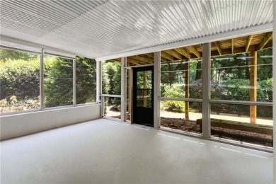 This beautiful home overlooks the golf course with primary on on The Golf Club of Georgia in Georgia - for sale on GolfHomes.com, golf home, golf lot