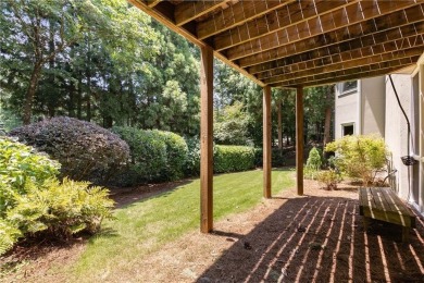 This beautiful home overlooks the golf course with primary on on The Golf Club of Georgia in Georgia - for sale on GolfHomes.com, golf home, golf lot