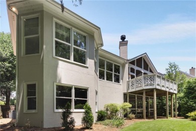This beautiful home overlooks the golf course with primary on on The Golf Club of Georgia in Georgia - for sale on GolfHomes.com, golf home, golf lot