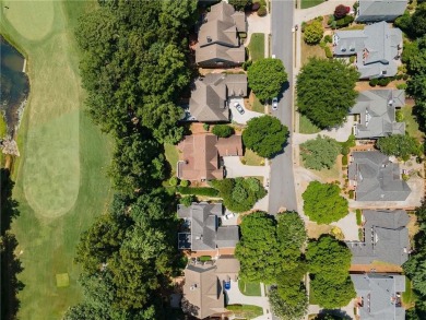 This beautiful home overlooks the golf course with primary on on The Golf Club of Georgia in Georgia - for sale on GolfHomes.com, golf home, golf lot