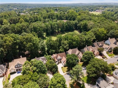 This beautiful home overlooks the golf course with primary on on The Golf Club of Georgia in Georgia - for sale on GolfHomes.com, golf home, golf lot