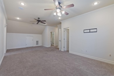 This one has it ALL! Situated on a large corner lot, this 4-bed on Centennial Valley Golf Course in Arkansas - for sale on GolfHomes.com, golf home, golf lot