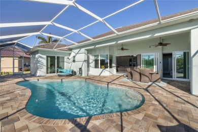 Set amidst private preserve and golf views, this better-than-new on Royal Tee Country Club in Florida - for sale on GolfHomes.com, golf home, golf lot