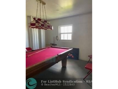 Enjoy resort-style living in this quaint 2-bedroom, 2-bathroom on Palm-Aire Country Club and Resort - The Oaks in Florida - for sale on GolfHomes.com, golf home, golf lot