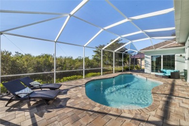 Set amidst private preserve and golf views, this better-than-new on Royal Tee Country Club in Florida - for sale on GolfHomes.com, golf home, golf lot