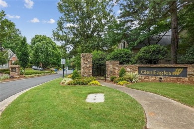 This beautiful home overlooks the golf course with primary on on The Golf Club of Georgia in Georgia - for sale on GolfHomes.com, golf home, golf lot