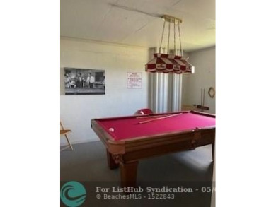 Enjoy resort-style living in this quaint 2-bedroom, 2-bathroom on Palm-Aire Country Club and Resort - The Oaks in Florida - for sale on GolfHomes.com, golf home, golf lot