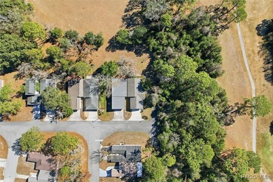 Tucked away at the end of a quiet road on a premium corner lot on Sugarmill Woods Golf and Country Club in Florida - for sale on GolfHomes.com, golf home, golf lot