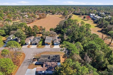 Tucked away at the end of a quiet road on a premium corner lot on Sugarmill Woods Golf and Country Club in Florida - for sale on GolfHomes.com, golf home, golf lot