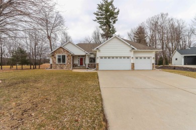 This stunning Craftsman 4bed, 3bath home offers luxury living on Foxfire Golf Club in Wisconsin - for sale on GolfHomes.com, golf home, golf lot