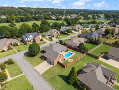 This one has it ALL! Situated on a large corner lot, this 4-bed on Centennial Valley Golf Course in Arkansas - for sale on GolfHomes.com, golf home, golf lot