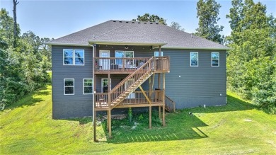 Tucked into the wooded hills of Bella Vista, this home delivers on Bella Vista Country Club - Highlands in Arkansas - for sale on GolfHomes.com, golf home, golf lot