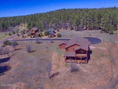 This luxury home is nestled in a quiet cul-de-sac on a  1/2 on Torreon Golf Club - Cabin in Arizona - for sale on GolfHomes.com, golf home, golf lot