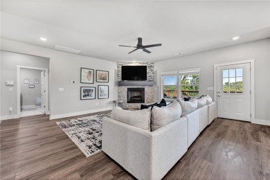 Tucked into the wooded hills of Bella Vista, this home delivers on Bella Vista Country Club - Highlands in Arkansas - for sale on GolfHomes.com, golf home, golf lot