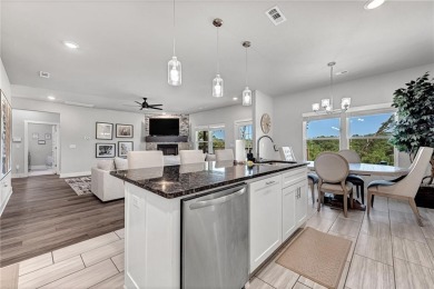 Tucked into the wooded hills of Bella Vista, this home delivers on Bella Vista Country Club - Highlands in Arkansas - for sale on GolfHomes.com, golf home, golf lot